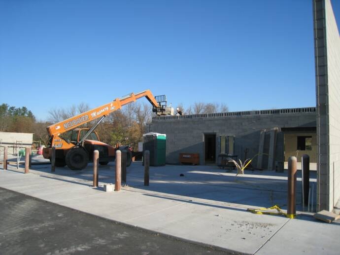 Neubauer Masonry Lull telehandler at a commercial masonry job site
